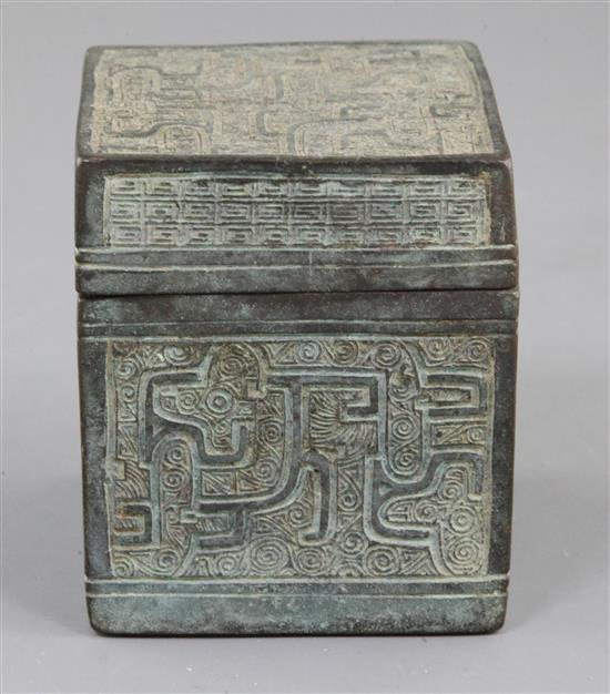 A Chinese archaic bronze square box and cover, Eastern Zhou dynasty, 6th-5th century B.C., 9.3cm high